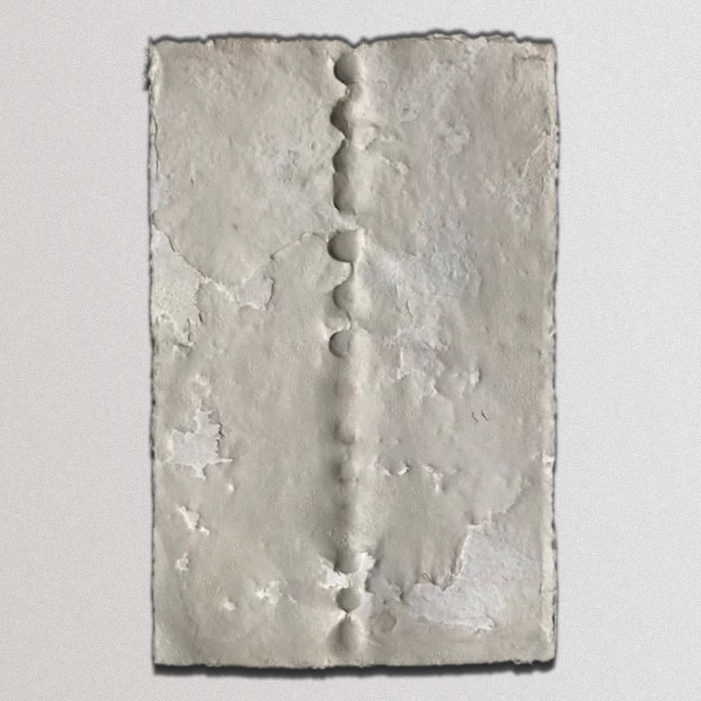 Spine, Cotton Linters, beach stones: 17”x26”, 2012